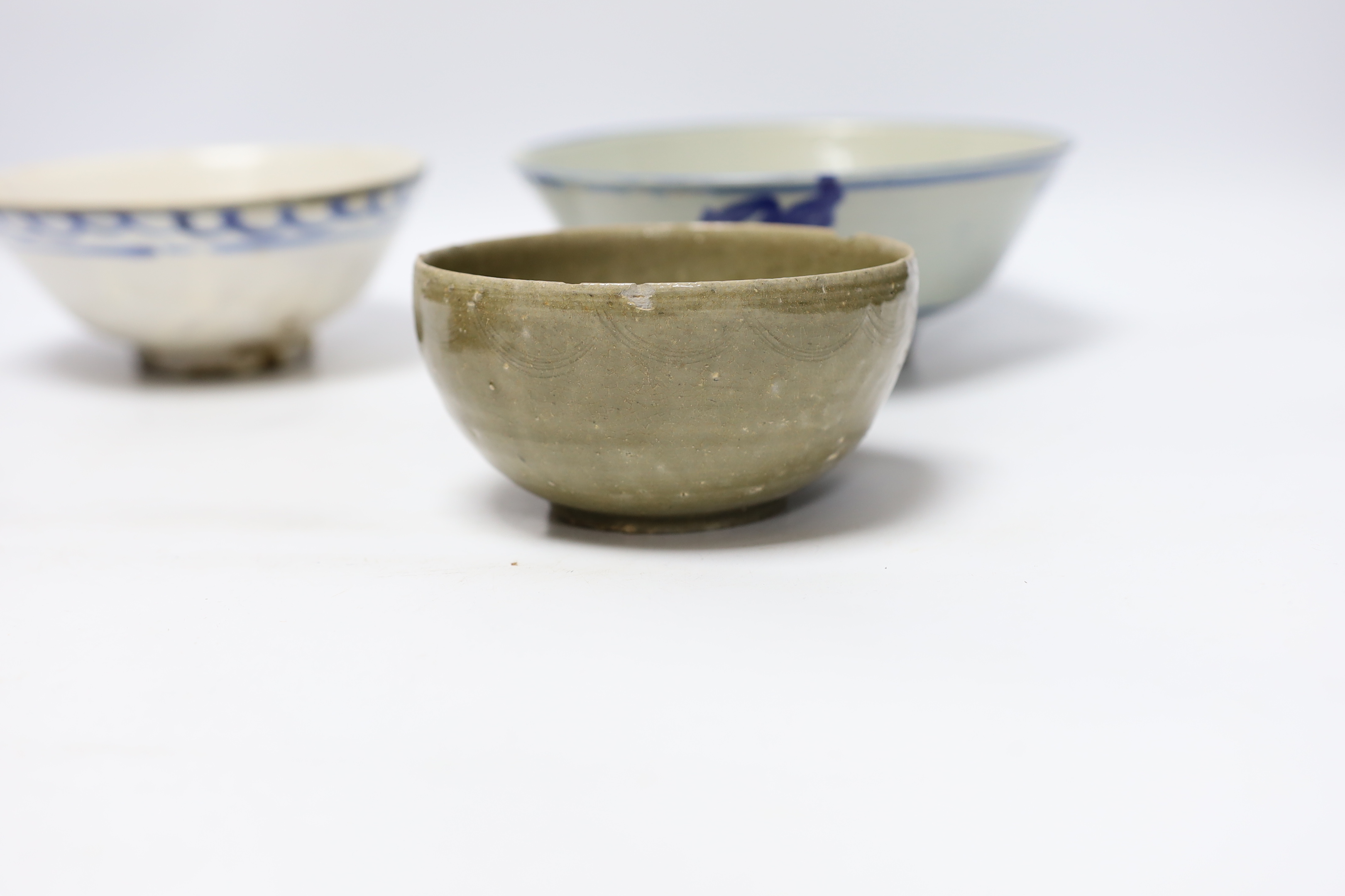 Three Chinese bowls including two blue and white examples, together with a ge ware type square dish, largest 20cm in diameter